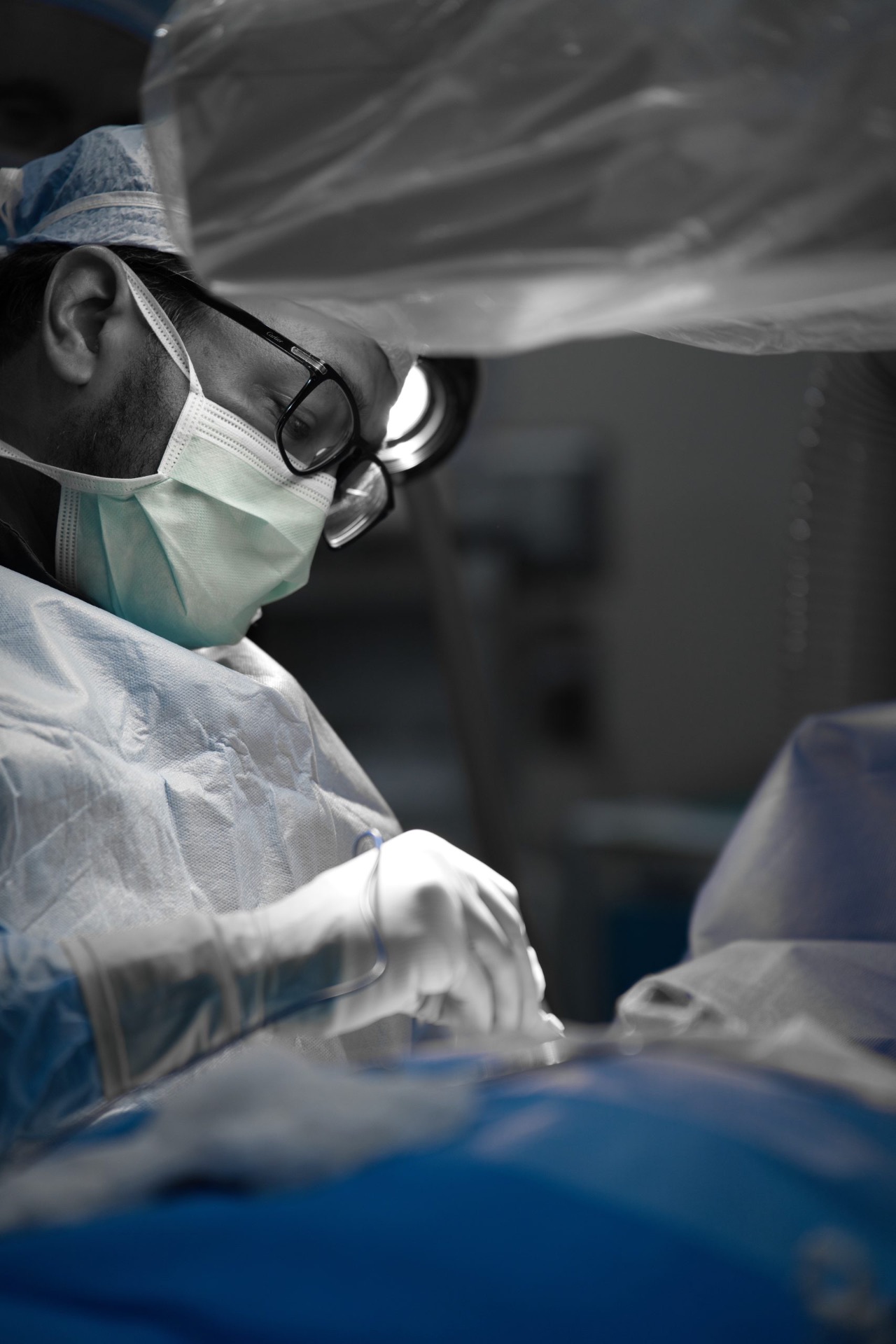 Surgeon performing a procedure in the operating room
